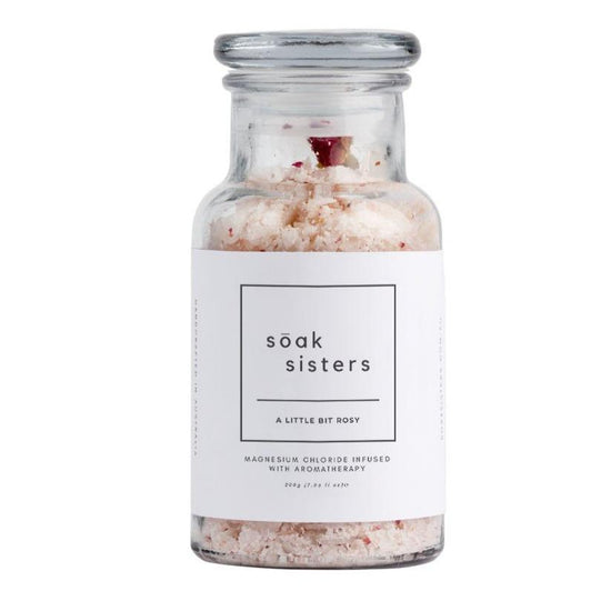 Medium jar of A Little Bit Rosy bath salts with white background