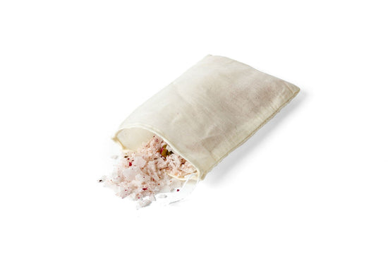 Muslin bag with bath salts spilling out